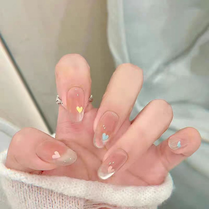 Künstlerisches Press-On-Nagelset mit floralem und herzförmigem Design Karnz