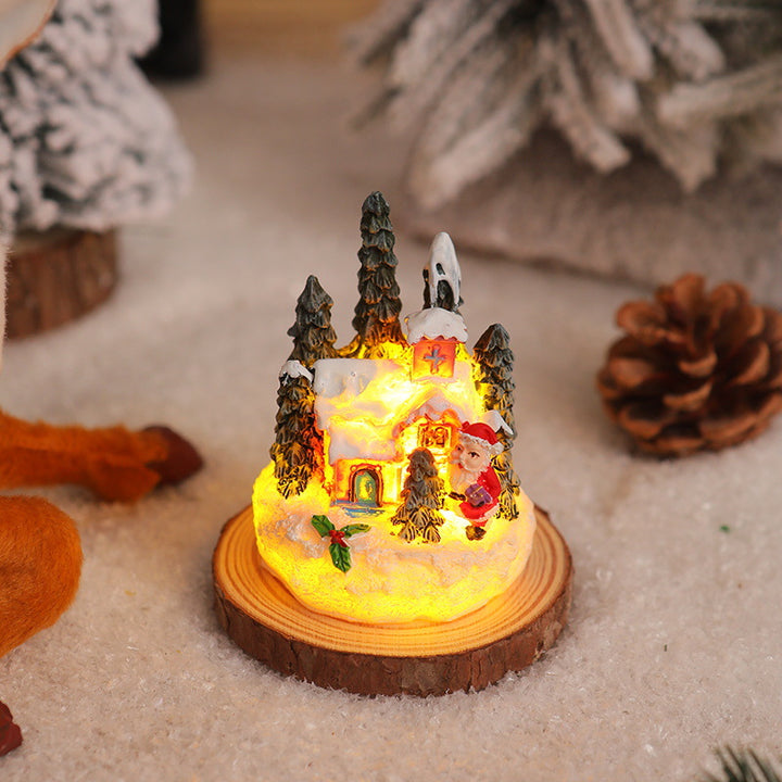 Weihnachtliche Miniaturbeleuchtung mit Schneeszenen Karnz