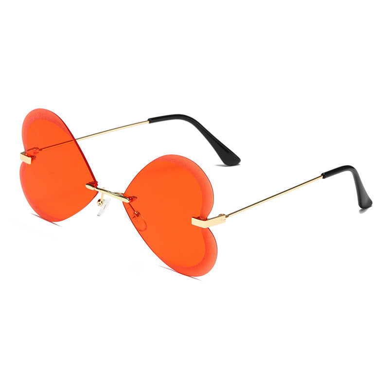 Damen Herzförmige Sonnenbrille im trendigen Design Karnz