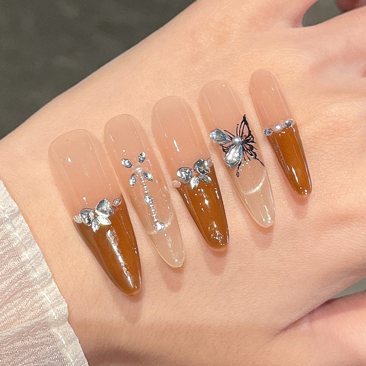 Künstlerische 3D Schmetterling und Edelstein Press-On Nagelverlängerungen Karnz