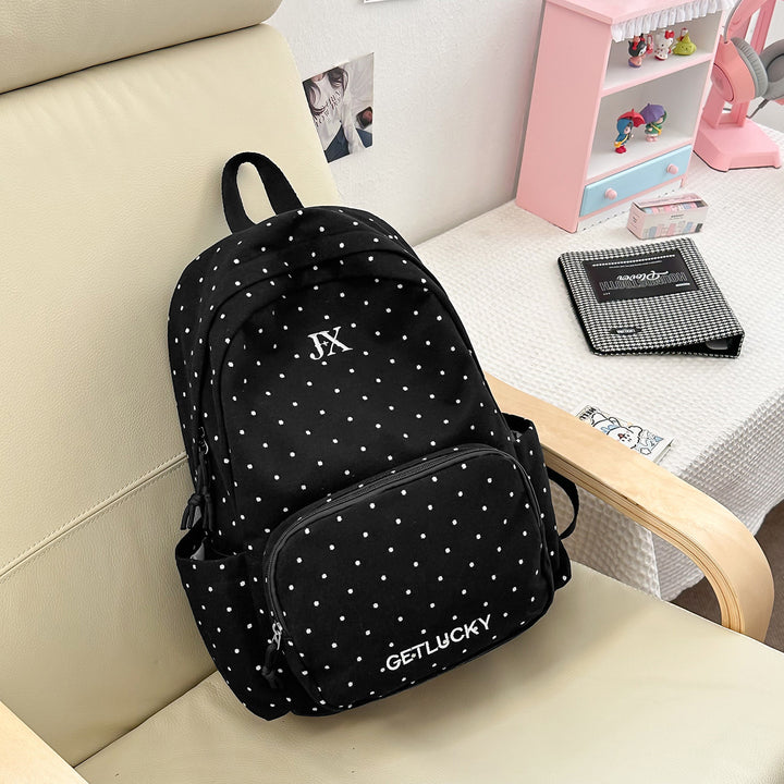 Taschen mit gepunktetem Muster
