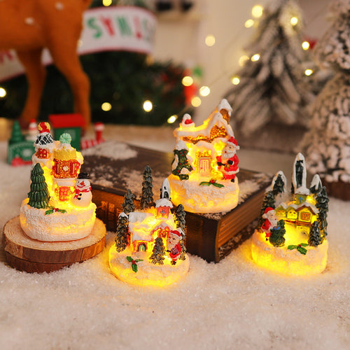 Weihnachtliche Miniaturbeleuchtung mit Schneeszenen Karnz