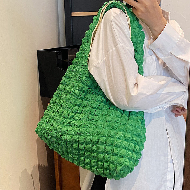Gemütliche strukturierte Schultertasche