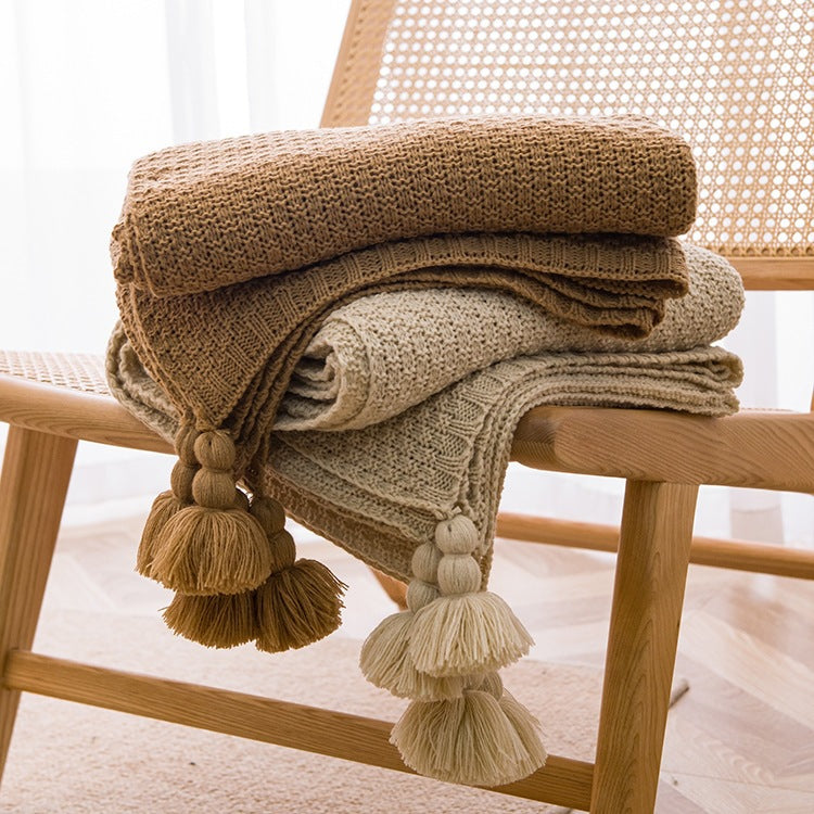 Strukturierte Strickwurfdecke