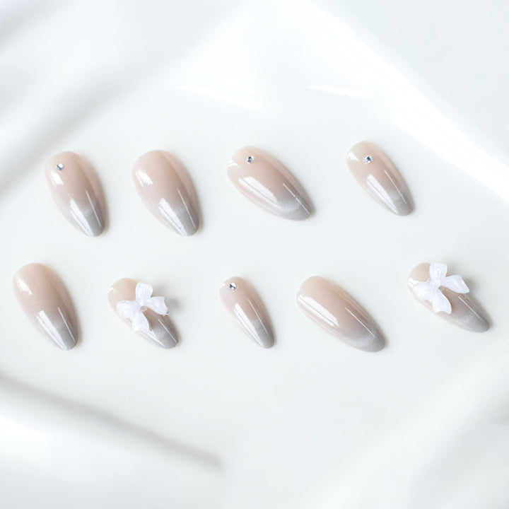Elegante Strass- und Schleifen-Nagelkunstverlängerungen Karnz