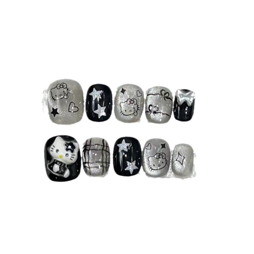 Spaß und verspieltes Press-On Nail Set mit Cartoon-Accents Karnz