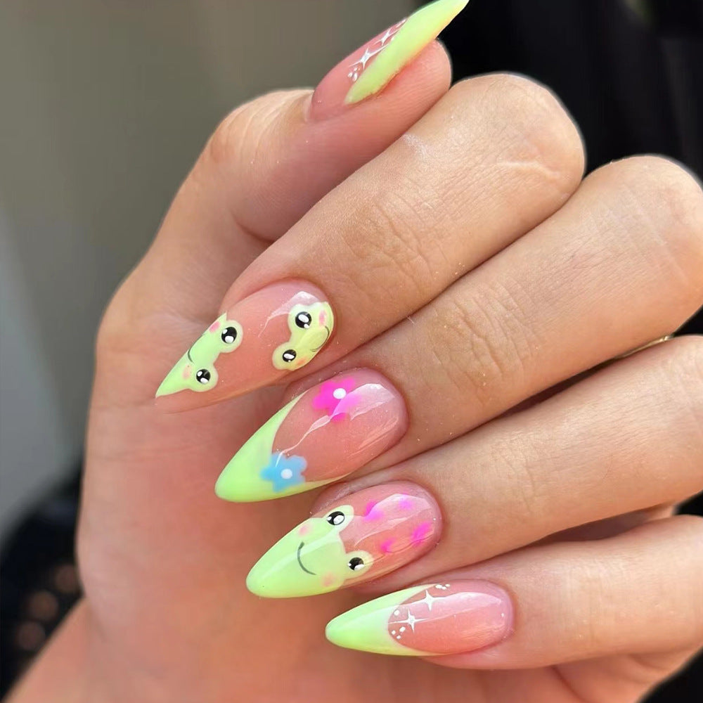 Kunstnagelset mit kreativen Froschmotiven und verspielten Akzenten Karnz
