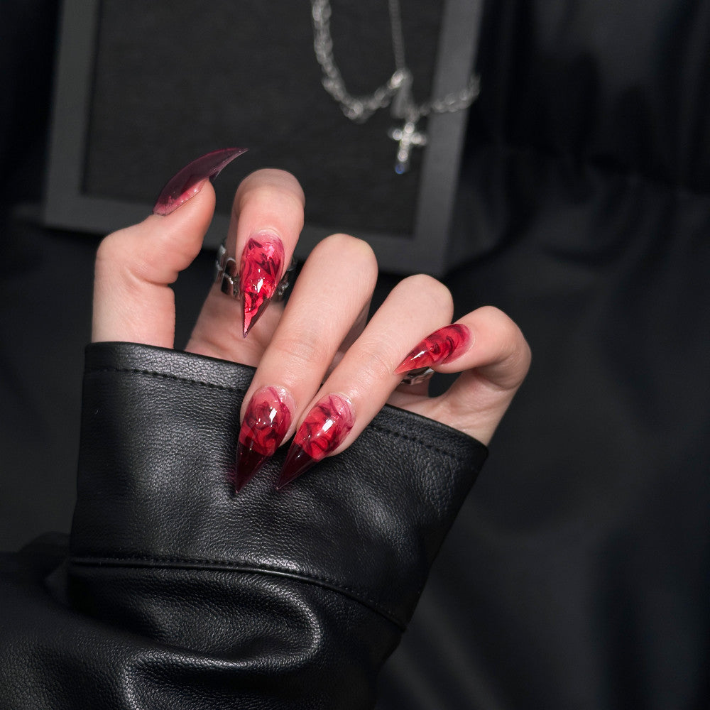 Künstlerische Stiletto Press-On Nagelverzierungen
