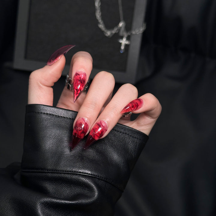 Künstlerische Stiletto Press-On Nagelverzierungen