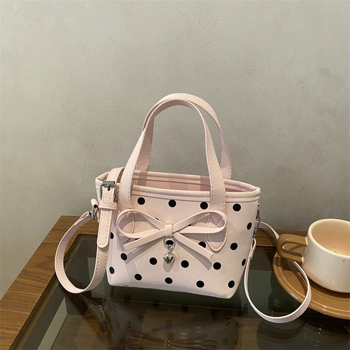 Charmante gepunktete Mini-Handtasche