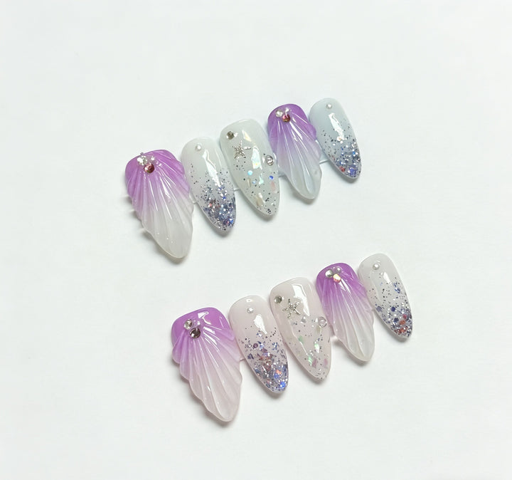 Dekorativer Press-On-Nagelset mit glitzerndem Ombre-Design