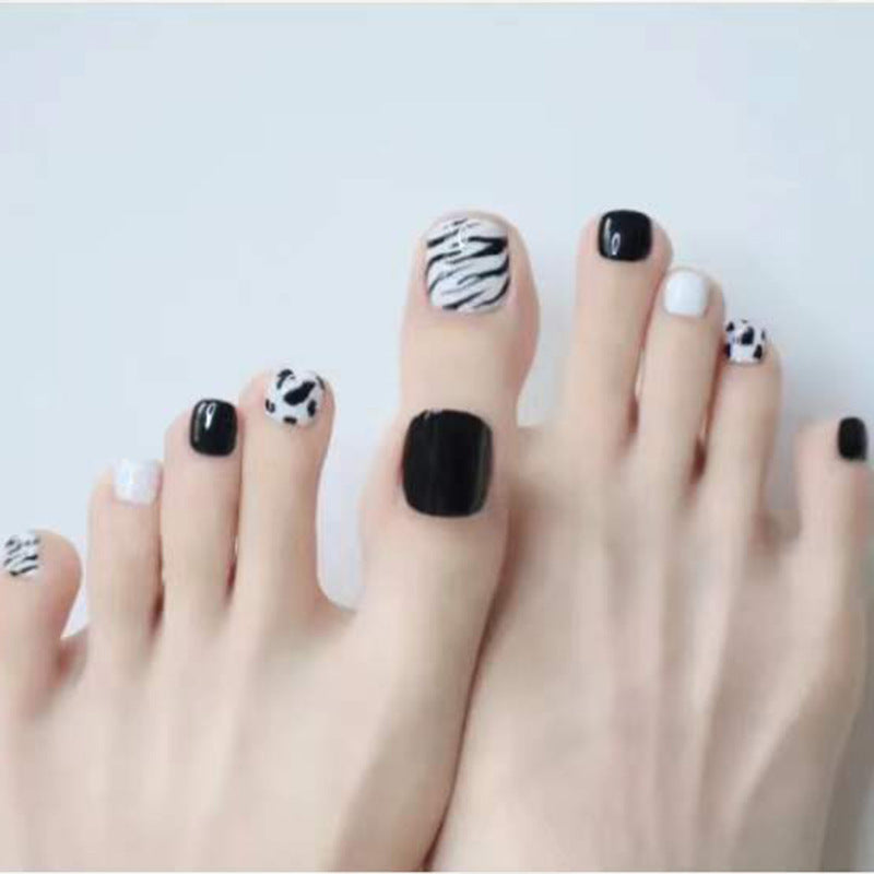 Künstlerisches Press-On Fußnagel Kunst Set mit Zebra Print Design