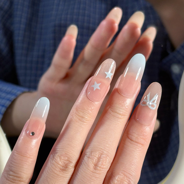 Glamouröse Ombre Press-On Nagelset mit dekorativen Stern- und Schleifenakzenten Karnz