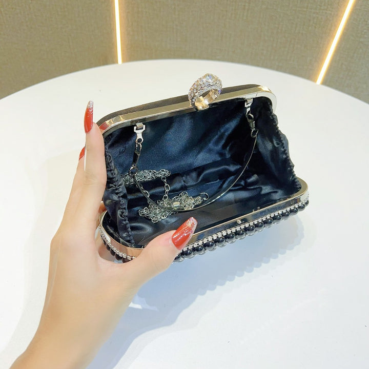 Perlenbesetzte Schmetterlings-Abend-Clutch