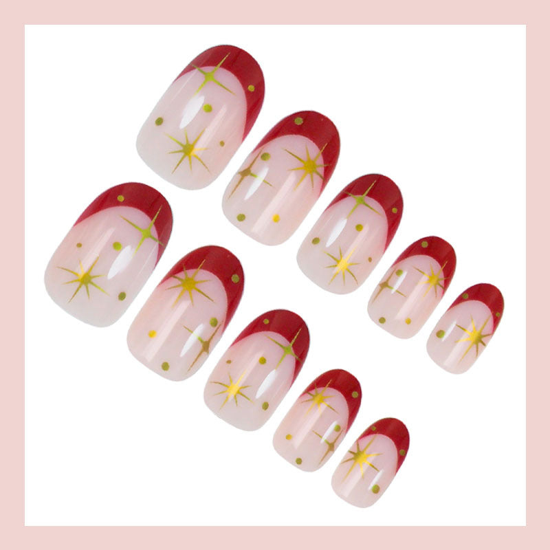 Kunstnagelset mit glamourösen Sternenmotiven und elegantem Farbverlauf Karnz