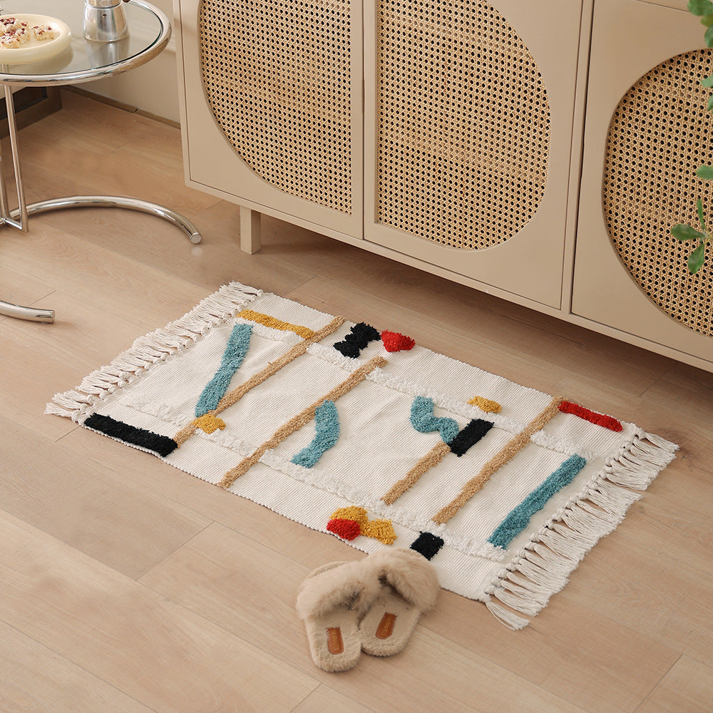Gewebter Vorleger im Boho-Minimalstil mit kontrastiertem Tufting und Baumwollfransen Karnz