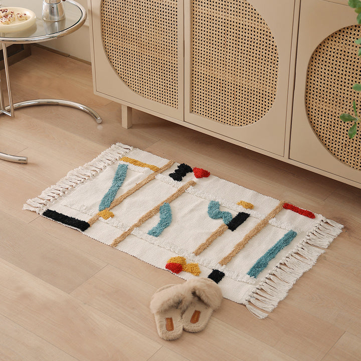 Gewebter Vorleger im Boho-Minimalstil mit kontrastiertem Tufting und Baumwollfransen Karnz