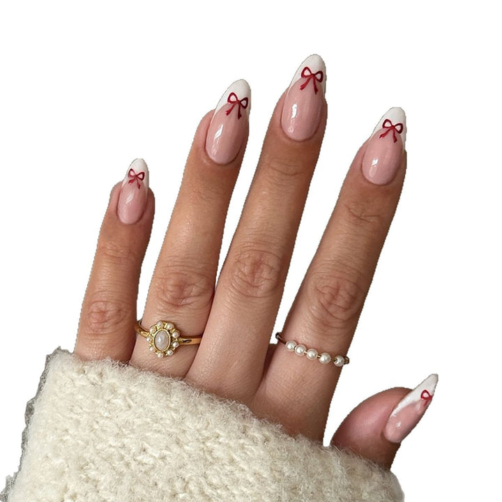 Kunstnagelset mit verspieltem Schleifen-Design Karnz