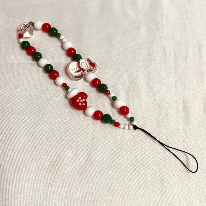 Festliches Perlen Charm Handyband Karnz