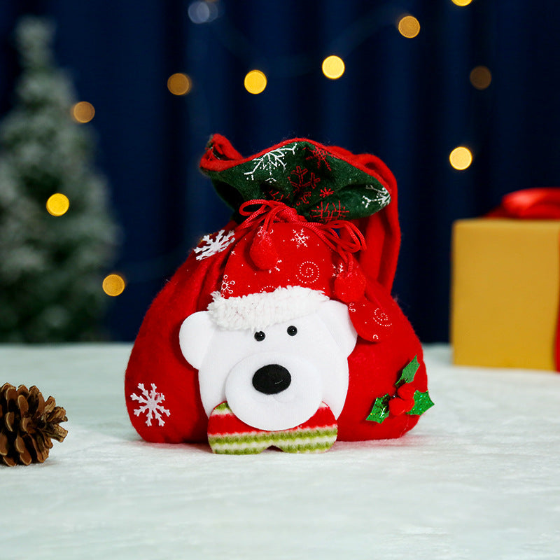 Niedlicher Weihnachtsgnom mit Geschenkesack Karnz