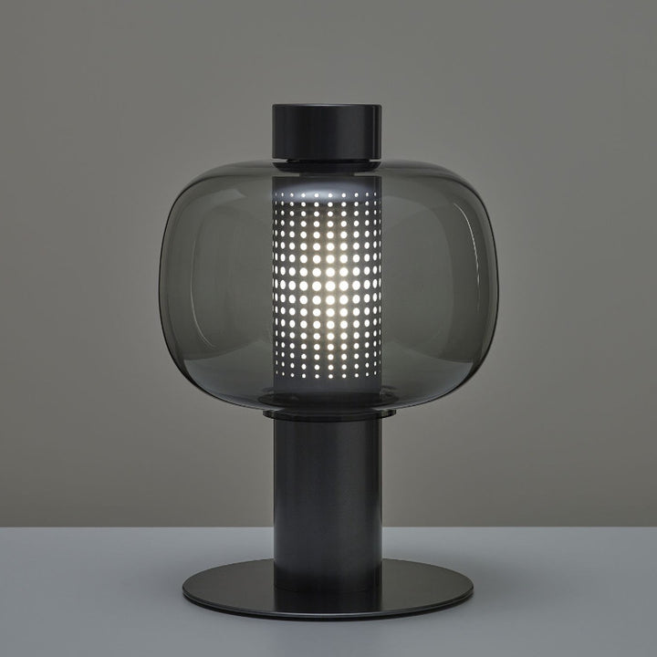 Künstlerische Tischlampe mit elegantem Glasschirm