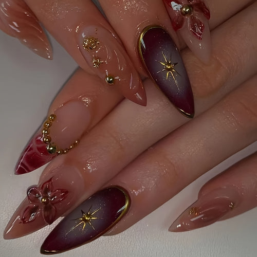 Künstlerische Stiletto-Press-On-Nägel mit floralen und sternförmigen Designs Karnz