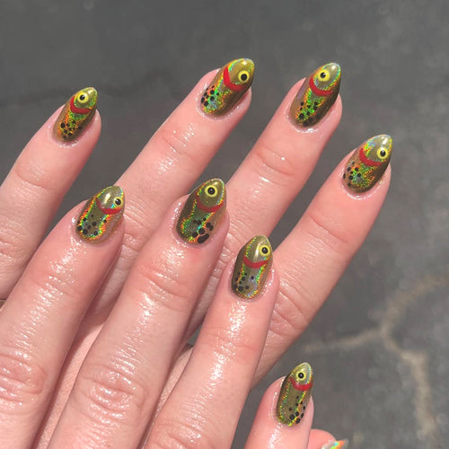Kunstnagelset mit kreativen 3D-Augen- und Glitzerakzenten Karnz