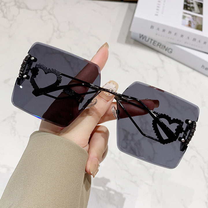 Damen modische Sonnenbrille mit trendigem Herz-Design Karnz