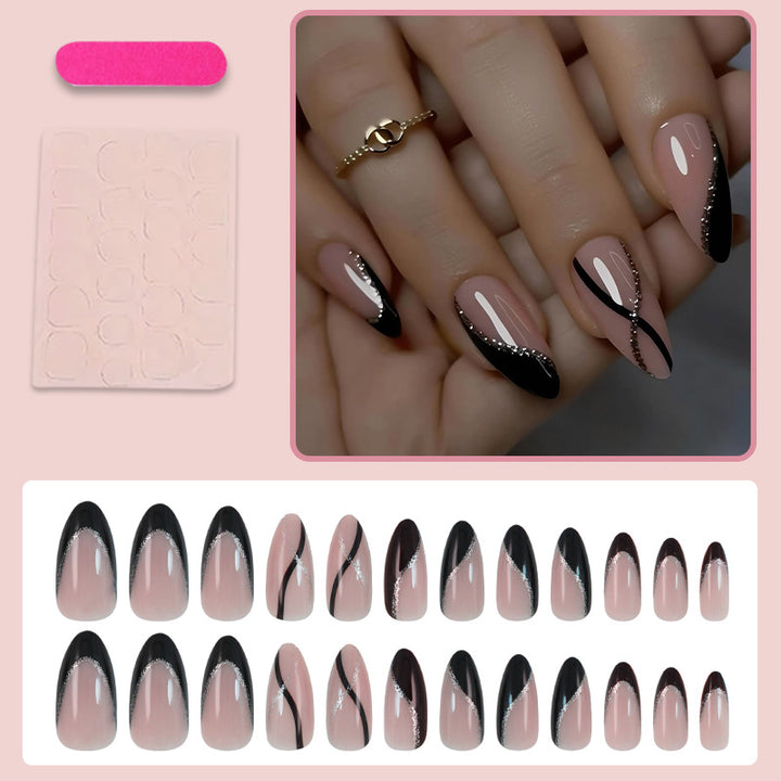 Kunstnagelset mit elegantem Schwarzweiß-Design und Glitzerakzenten Karnz