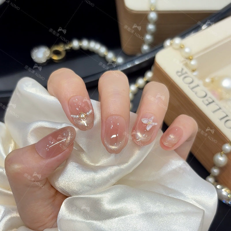 Elegantes Press-On Nagelset mit Kristallakzenten