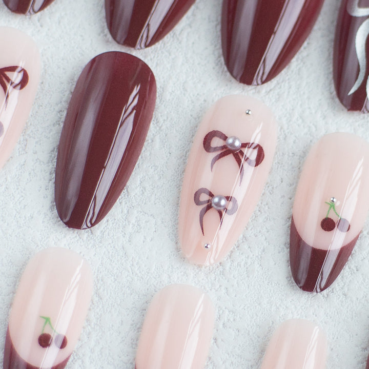Elegantes Schleifen- und Kirschdesign Nagelkunstset
