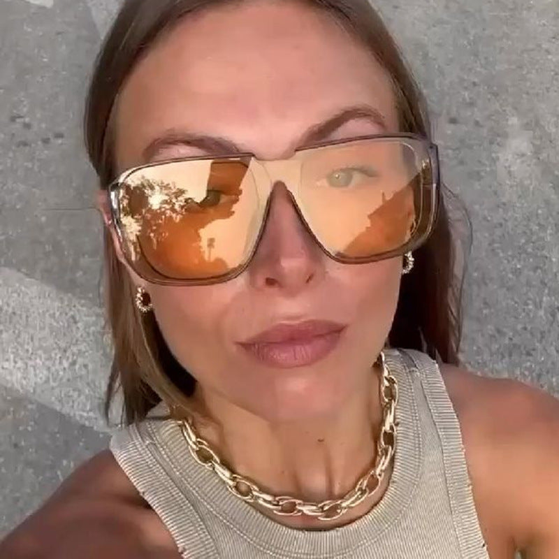Damen trendy quadratische Sonnenbrille mit transparentem, grünem Rahmen und schützendem UV-Filter Karnz