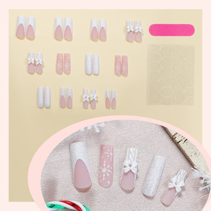 Kunstnagelset mit eleganten Blüten- und Glitzerverzierungen Karnz