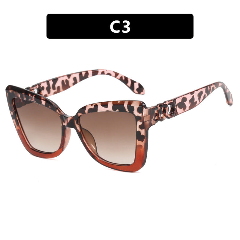 Damen trendige Katzenaugen-Sonnenbrille mit raffiniertem Muster Karnz