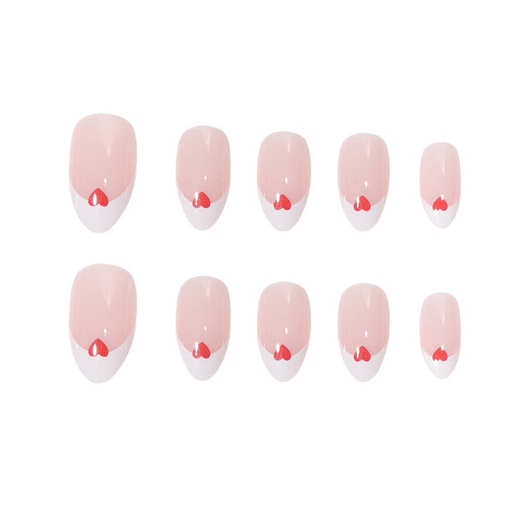 Herzgeschmücktes French Tip Nagelset Karnz