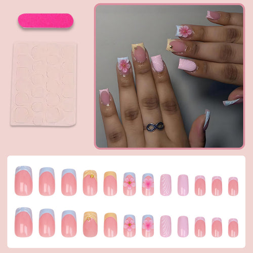 Kunstnagelset mit eleganten Blütenmotiven und farbenfrohen Designs Karnz
