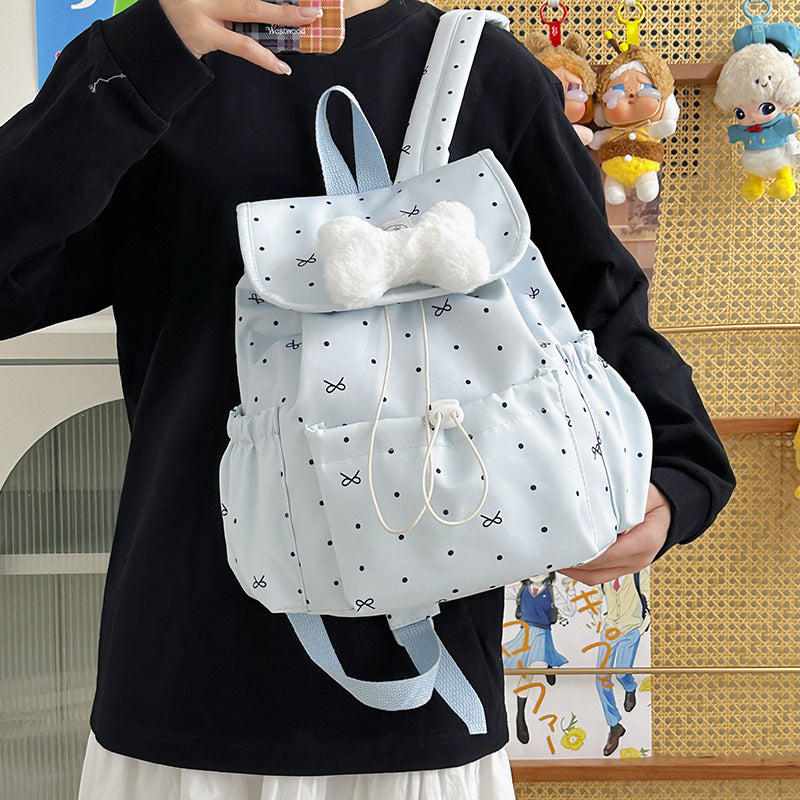 Verspielt gepunkteter Mini-Rucksack