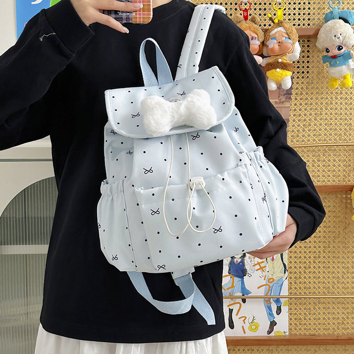 Verspielt gepunkteter Mini-Rucksack