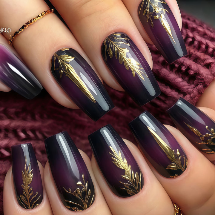 Kunstnägel im eleganten Ombré-Design mit goldenen Akzenten Karnz