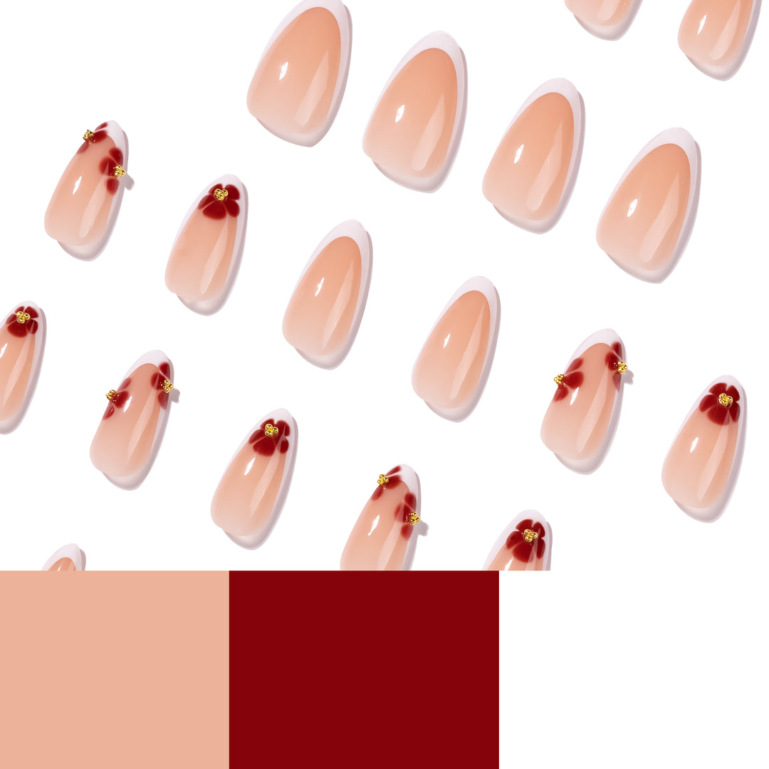 Kunstvolle Stiletto-Nägel mit luxuriösem floralem Design Karnz