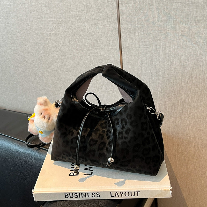 Stylische und funktionale Drawstring-Handtasche Karnz