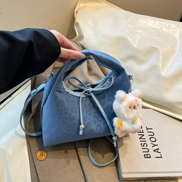 Stylische und funktionale Drawstring-Handtasche Karnz
