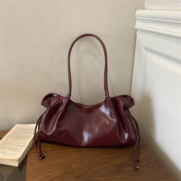 Glänzende Kunstleder-Handtasche