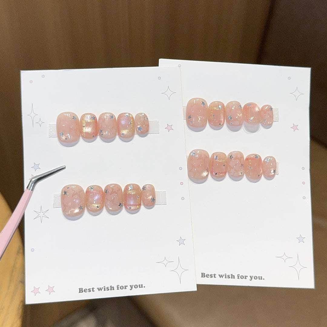 Glamouröse Kunstnagelspitzen mit Sternen Design Karnz
