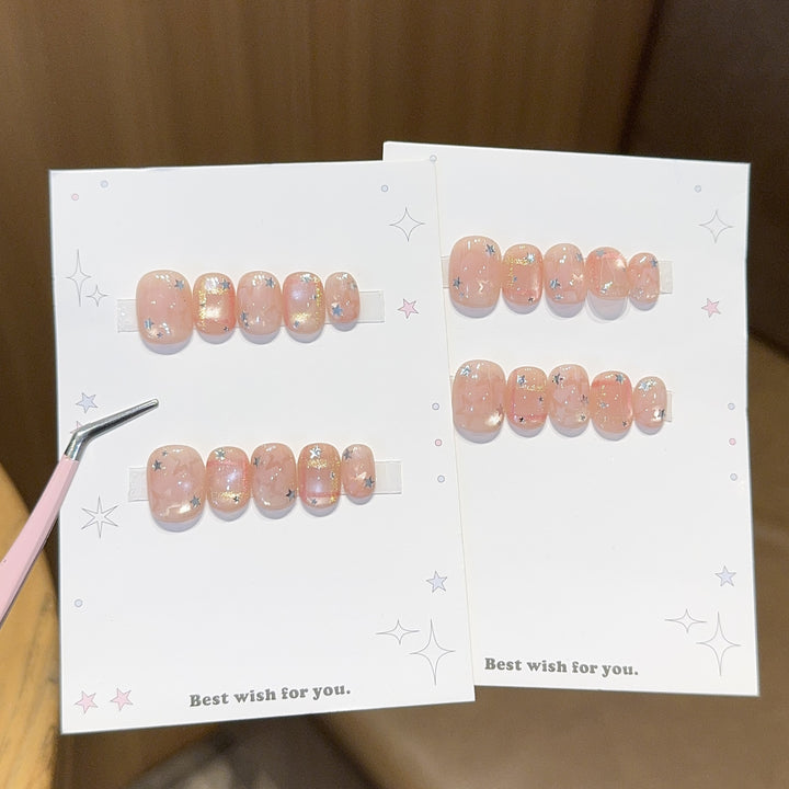 Glamouröse Kunstnagelspitzen mit Sternen Design Karnz
