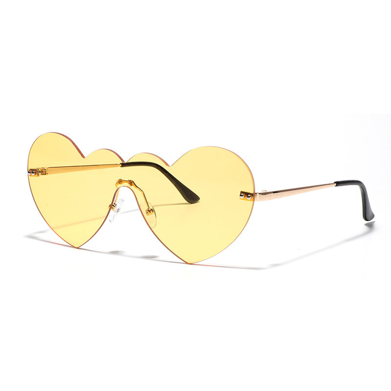 Damen extravagante Herz-Sonnenbrille mit schützenden Gläsern Karnz