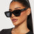 Damen quadratische Sonnenbrille mit transparentem Rahmen und braunen Gläsern Karnz