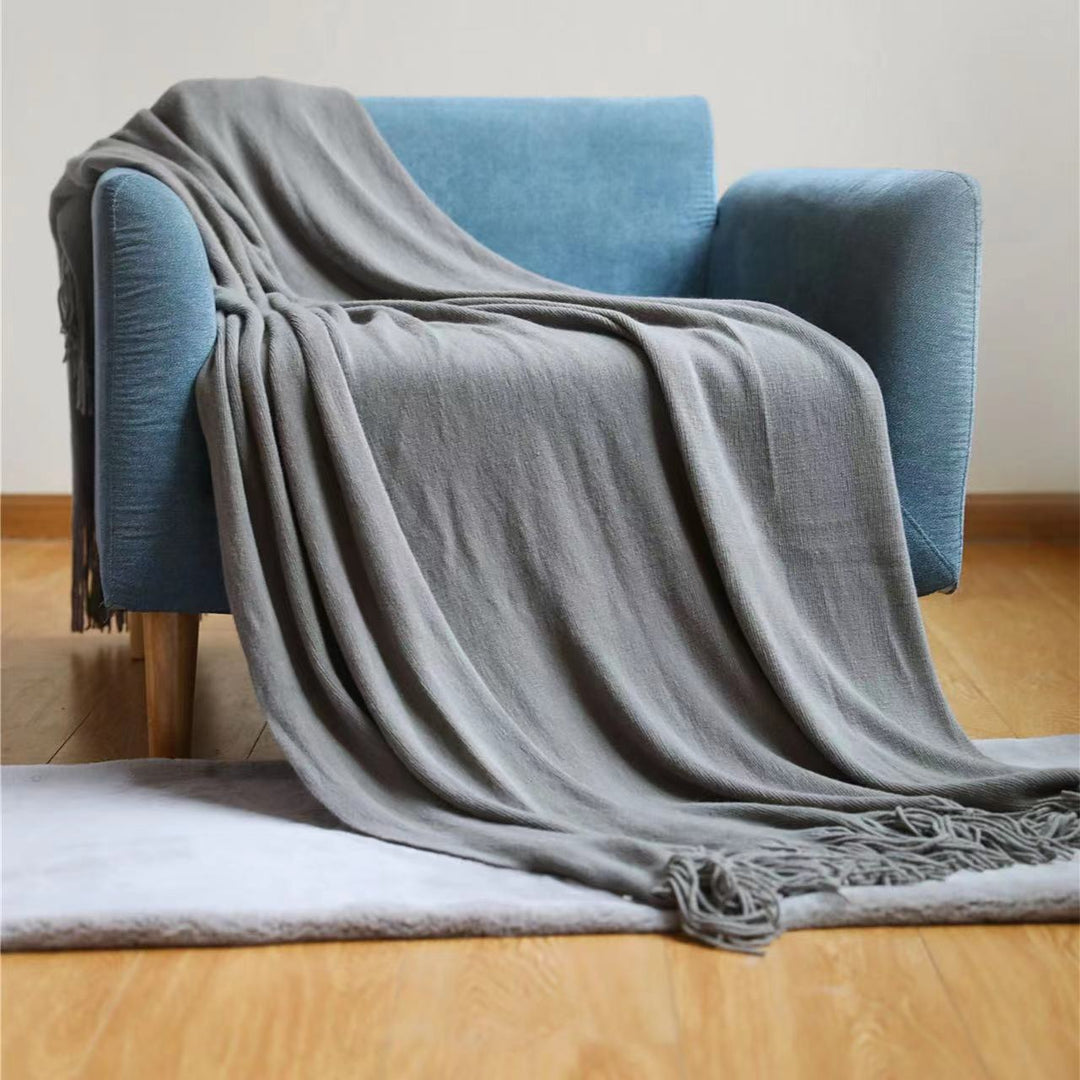 Luxuriöse Fransen-Strickwurfdecke