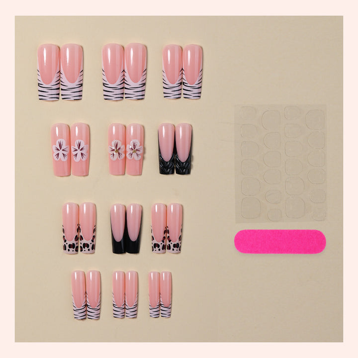 Künstlerisches Nagelkunst Press-On Set mit Blumen- und Tiermustern Karnz