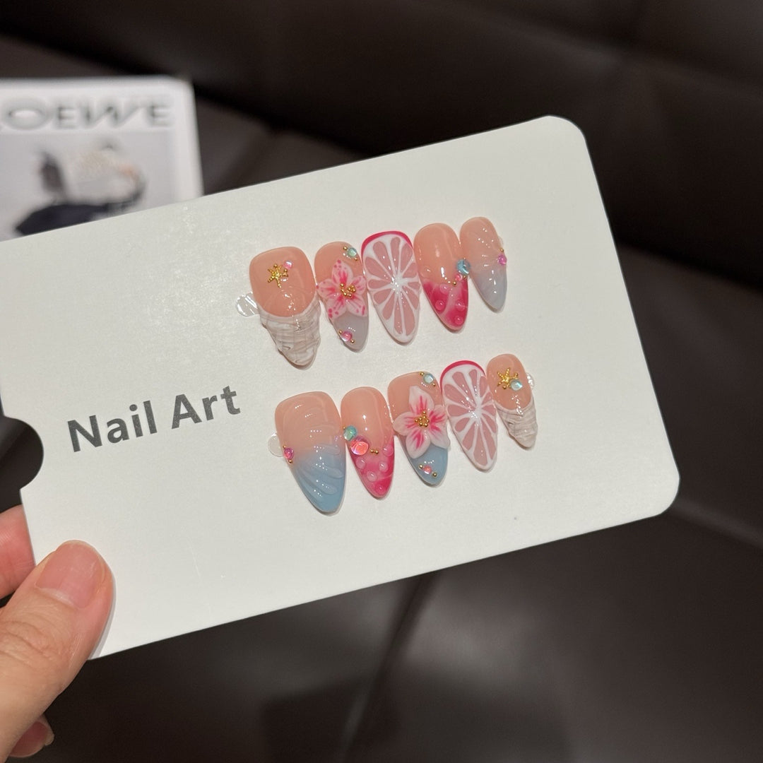 Dekoratives Press-On Nagelkunstset mit Blumen- und Zitrusdesigns